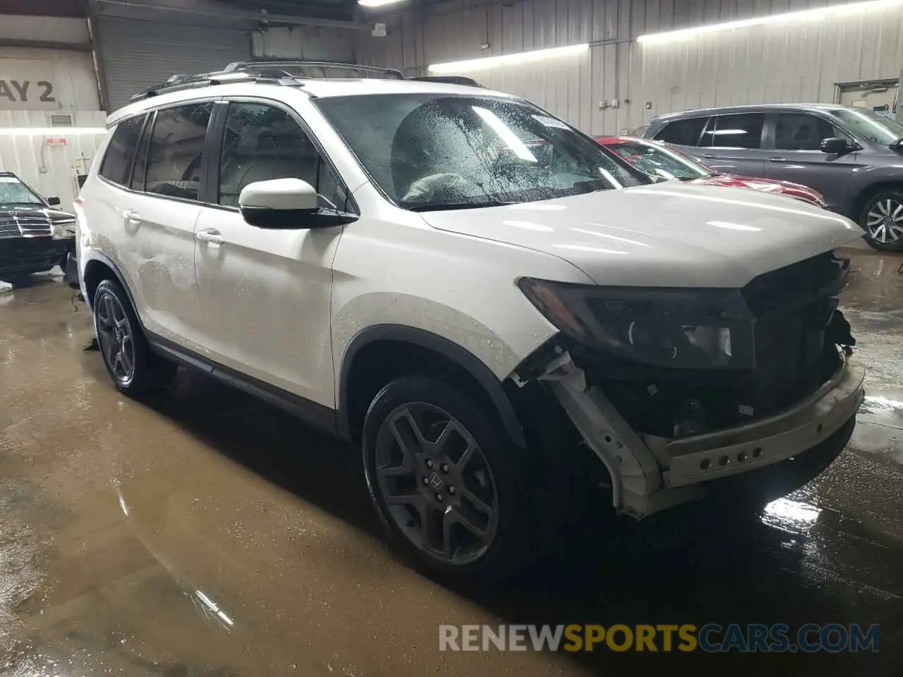 4 Фотография поврежденного автомобиля 5FNYF8H59PB011459 HONDA PASSPORT 2023