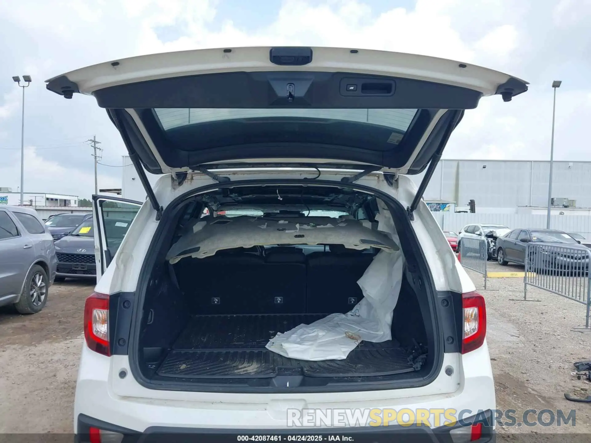 18 Photograph of a damaged car 5FNYF8H62PB024269 HONDA PASSPORT 2023