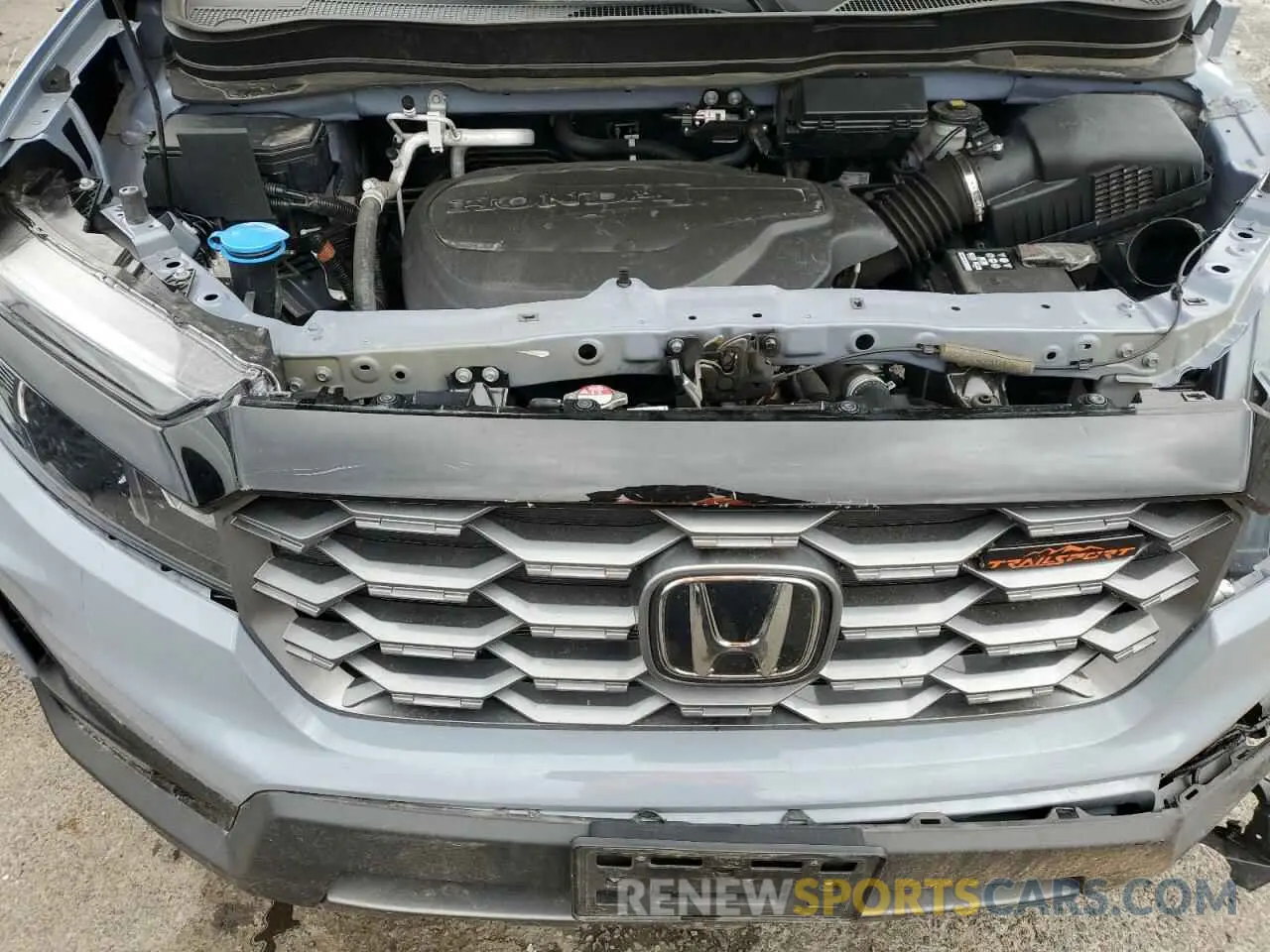 12 Photograph of a damaged car 5FNYF8H63PB031232 HONDA PASSPORT 2023