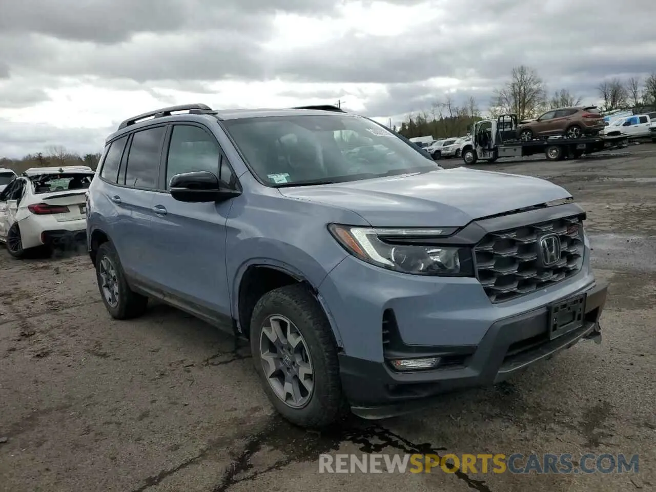 4 Photograph of a damaged car 5FNYF8H63PB031232 HONDA PASSPORT 2023
