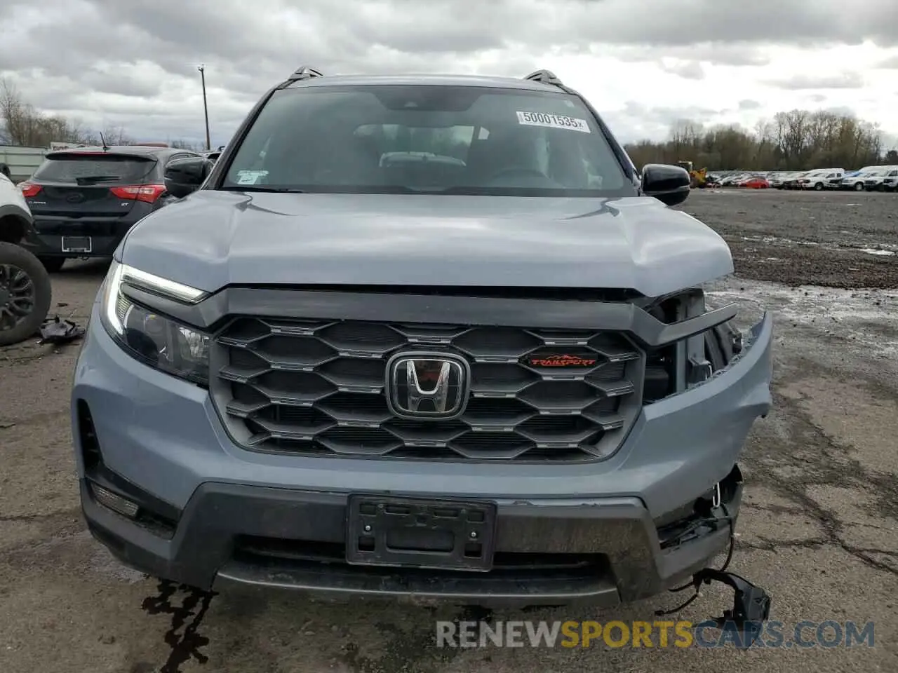 5 Photograph of a damaged car 5FNYF8H63PB031232 HONDA PASSPORT 2023