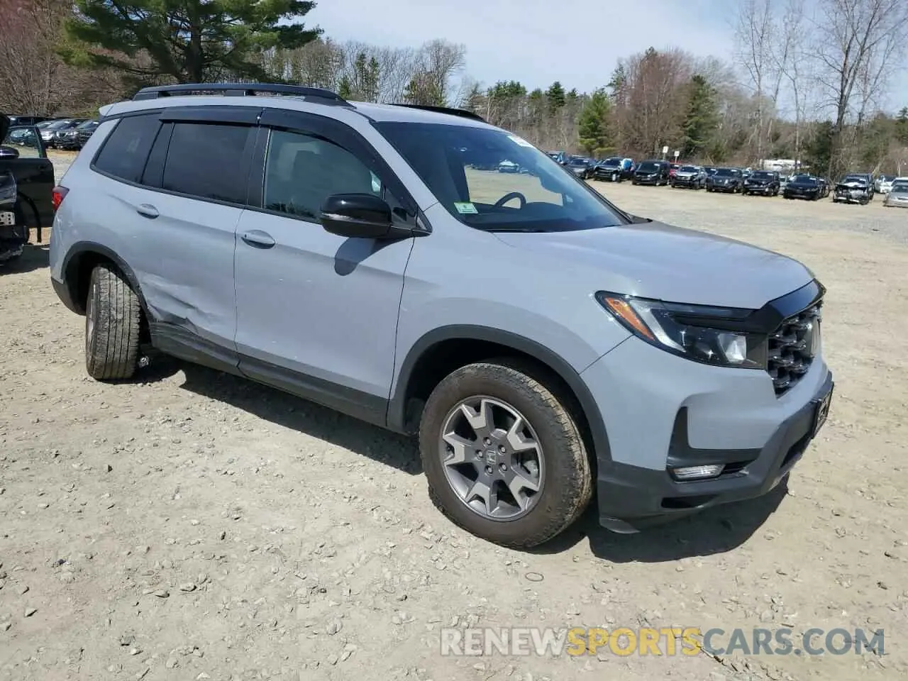4 Photograph of a damaged car 5FNYF8H64PB032311 HONDA PASSPORT 2023