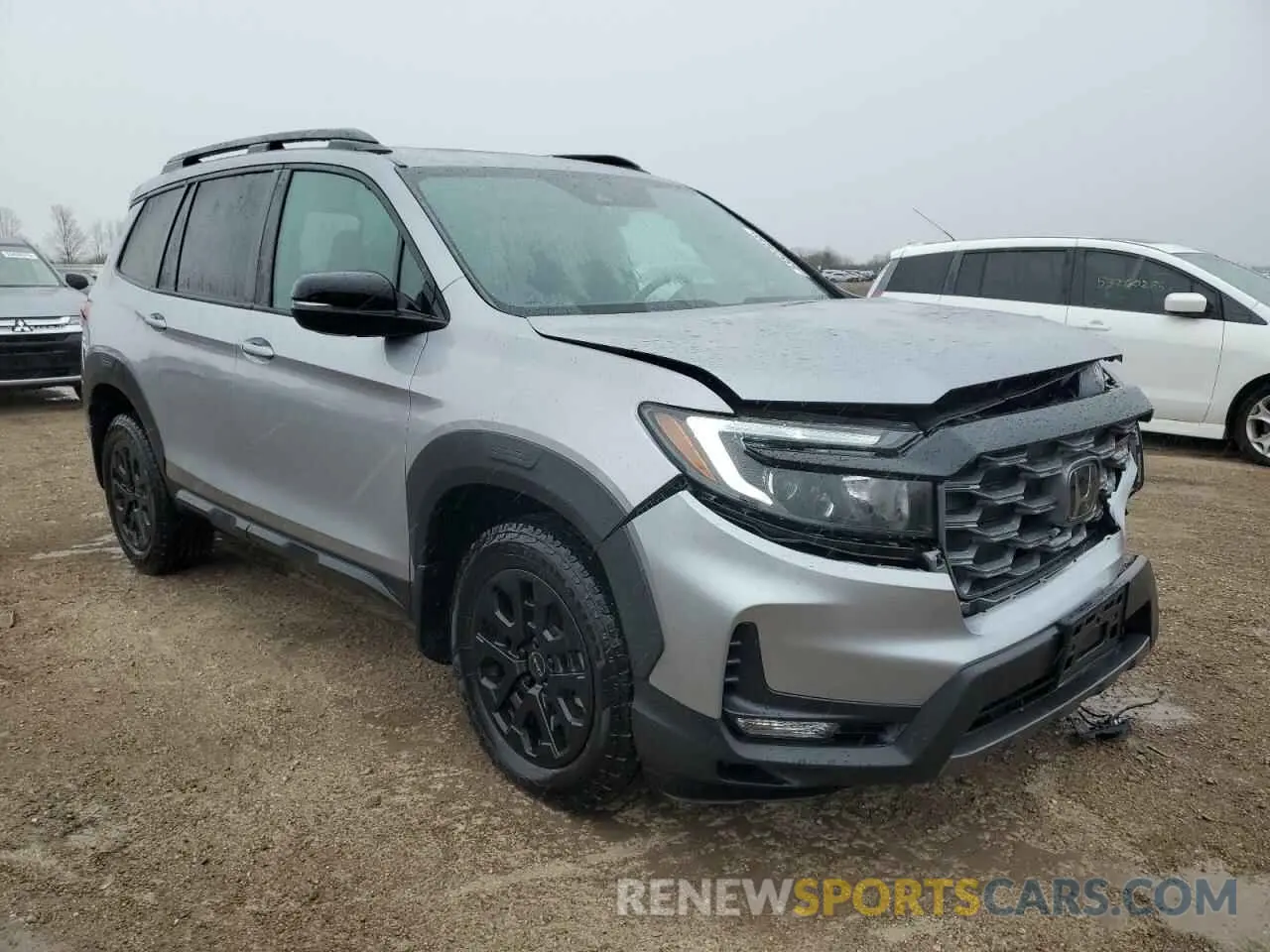 4 Фотография поврежденного автомобиля 5FNYF8H64PB044233 HONDA PASSPORT 2023