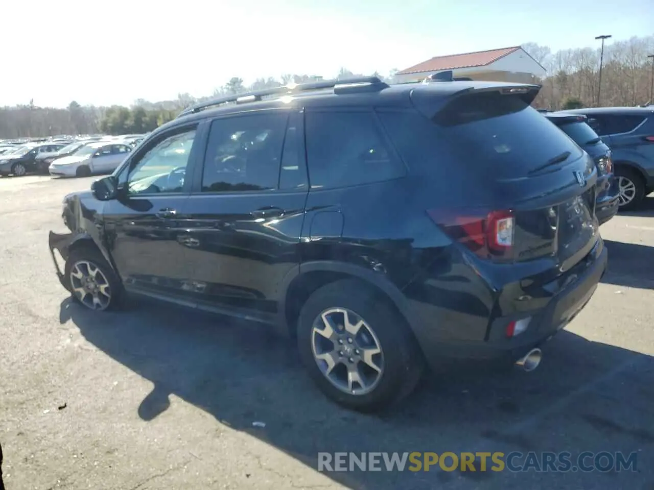 2 Фотография поврежденного автомобиля 5FNYF8H65PB018465 HONDA PASSPORT 2023