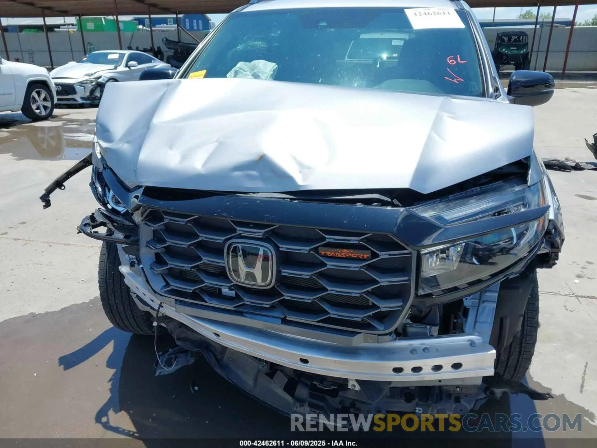 6 Photograph of a damaged car 5FNYF8H66PB044234 HONDA PASSPORT 2023