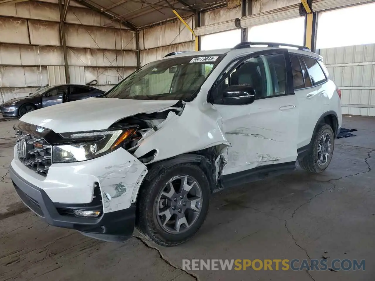 1 Фотография поврежденного автомобиля 5FNYF8H68PB000476 HONDA PASSPORT 2023