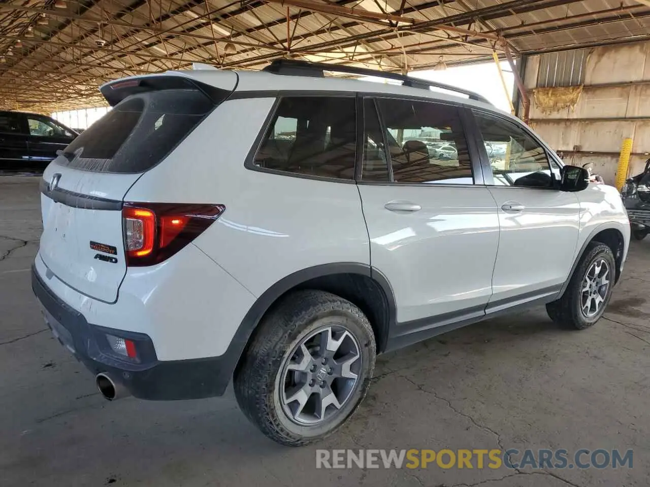 3 Фотография поврежденного автомобиля 5FNYF8H68PB000476 HONDA PASSPORT 2023