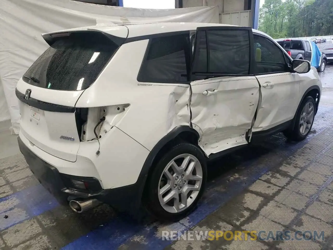 3 Photograph of a damaged car 5FNYF8H54RB020153 HONDA PASSPORT 2024