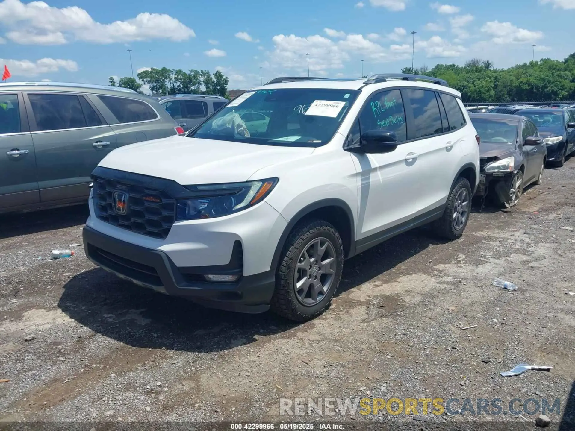 2 Photograph of a damaged car 5FNYF8H63RB009699 HONDA PASSPORT 2024