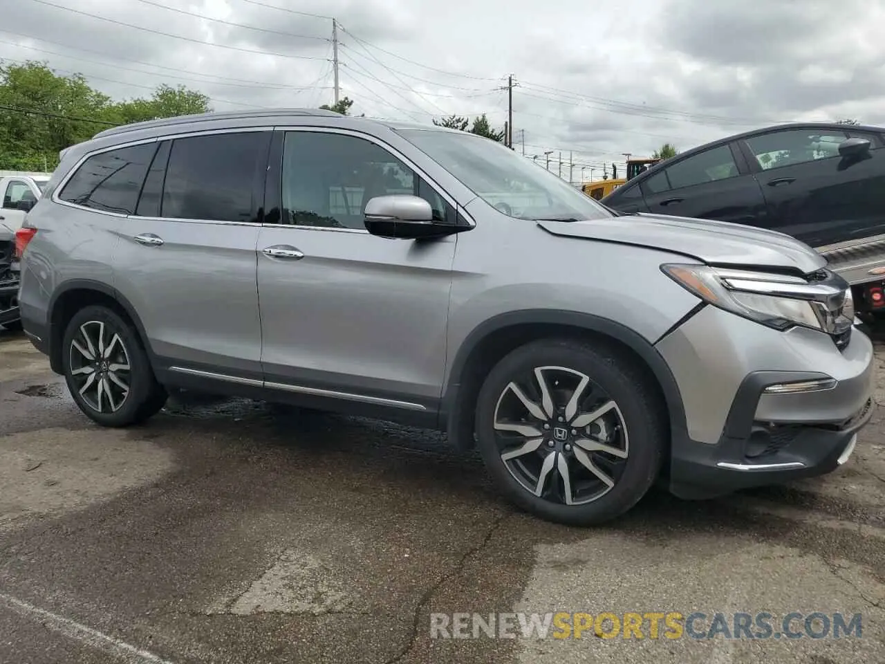 4 Photograph of a damaged car 5FNYF5H91KB033661 HONDA PILOT 2019