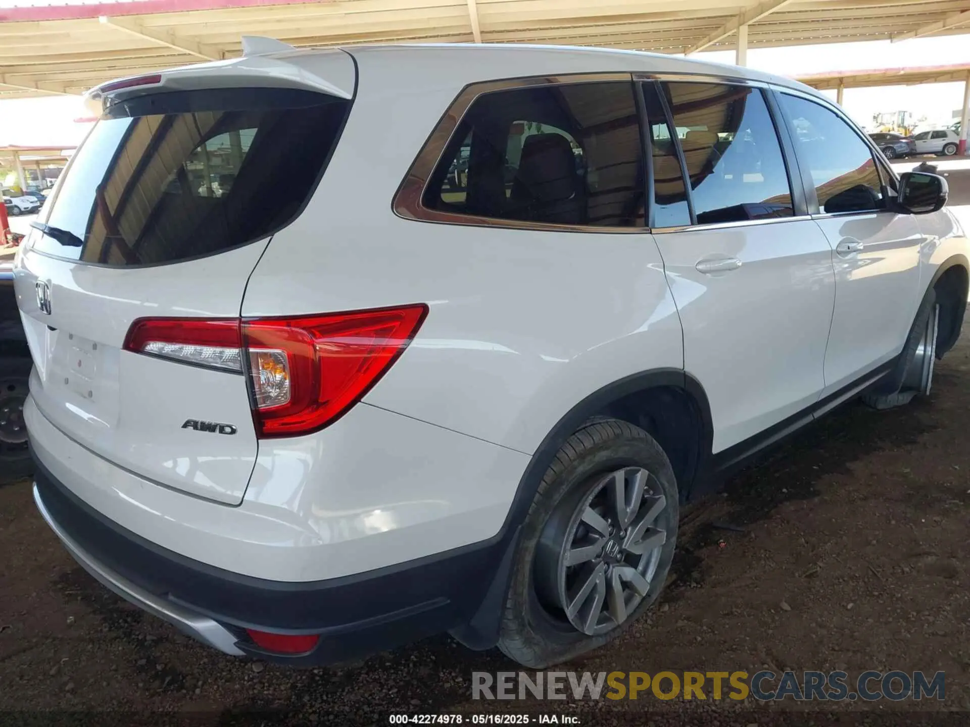 4 Photograph of a damaged car 5FNYF6H39MB075483 HONDA PILOT 2021