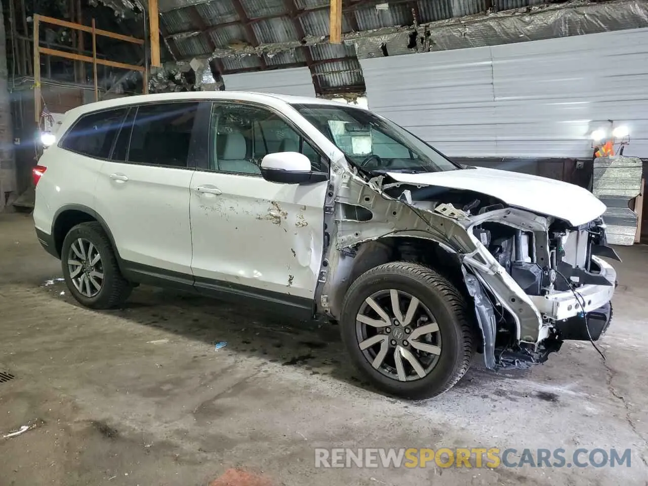 4 Photograph of a damaged car 5FNYF6H56MB003786 HONDA PILOT 2021