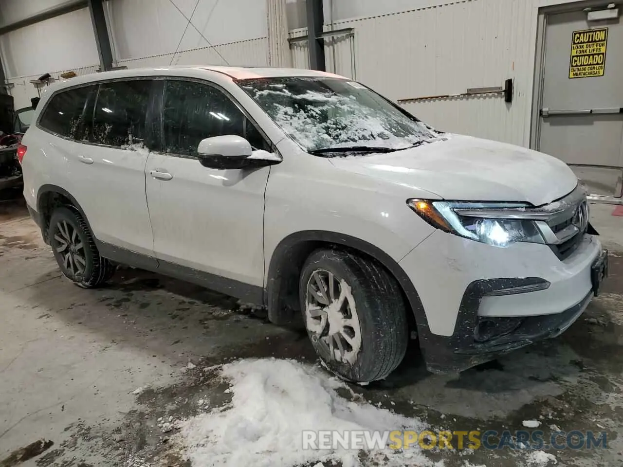 4 Photograph of a damaged car 5FNYF6H56MB007952 HONDA PILOT 2021