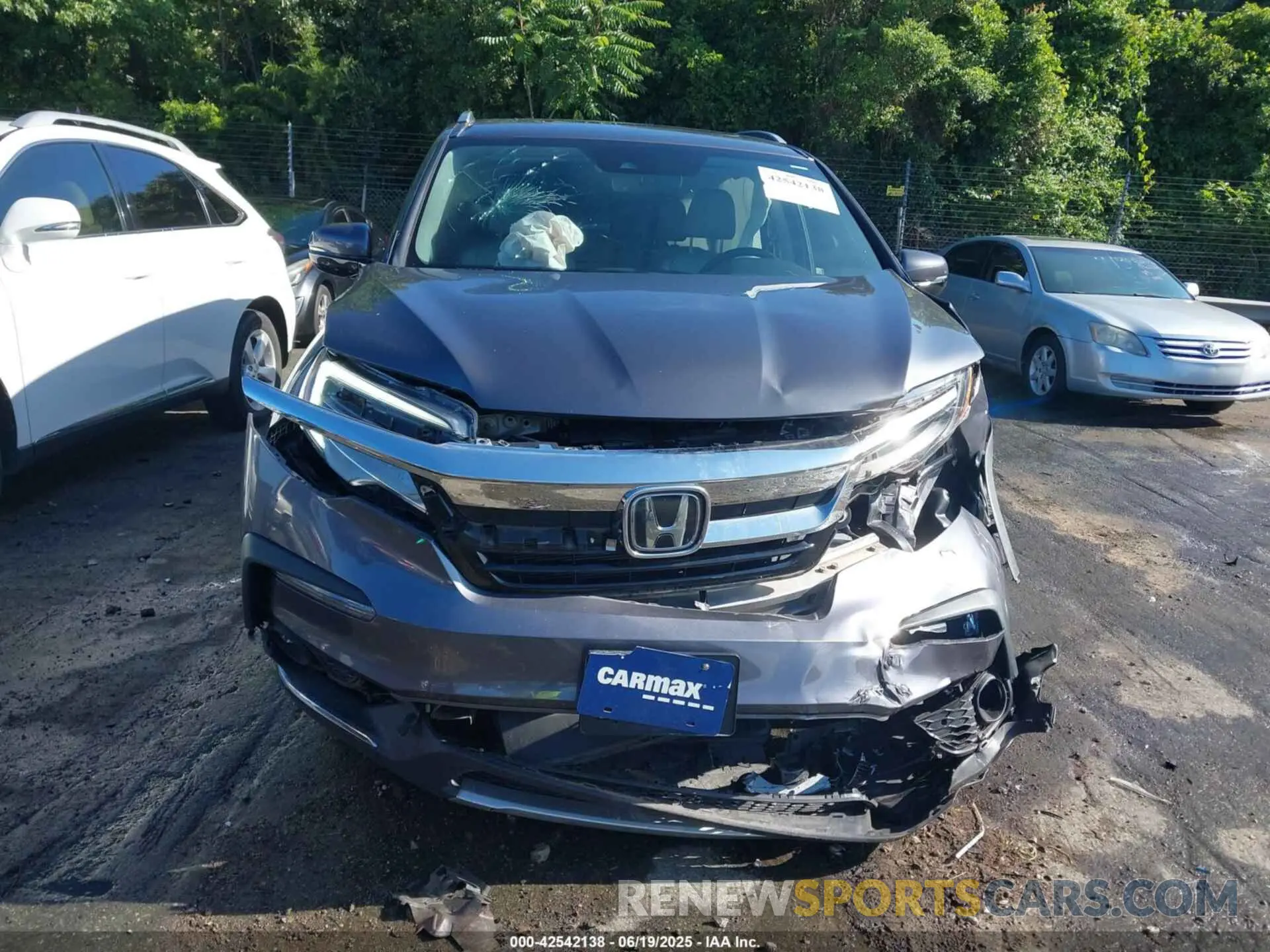 12 Photograph of a damaged car 5FNYF6H95MB048527 HONDA PILOT 2021