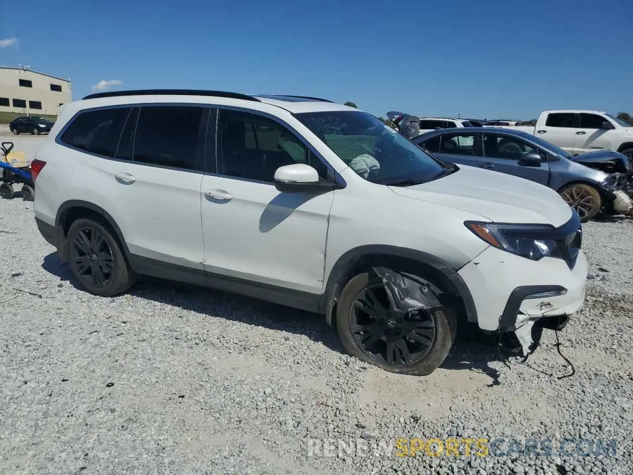 4 Photograph of a damaged car 5FNYF5H25NB029961 HONDA PILOT 2022
