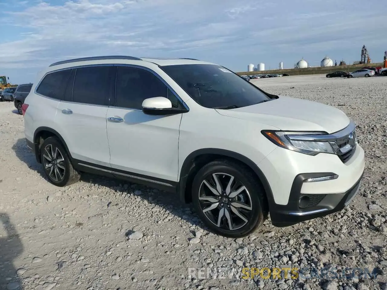 4 Photograph of a damaged car 5FNYF5H65NB011768 HONDA PILOT 2022