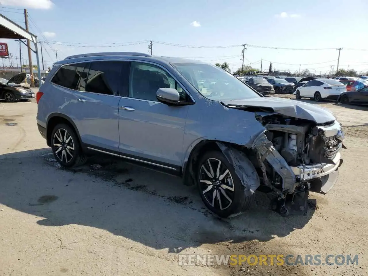 4 Photograph of a damaged car 5FNYF6H06NB039385 HONDA PILOT 2022