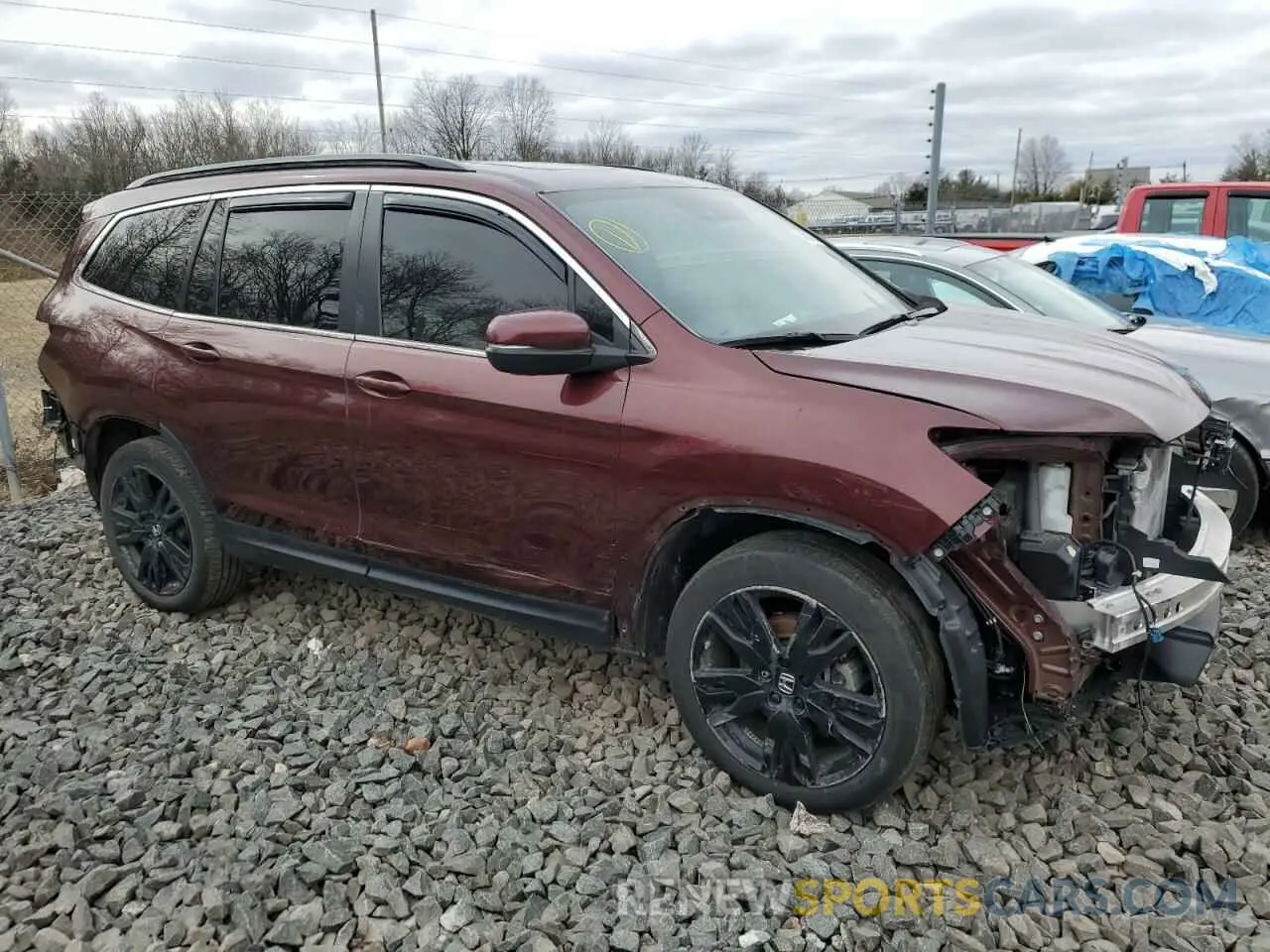 4 Photograph of a damaged car 5FNYF6H25NB033756 HONDA PILOT 2022