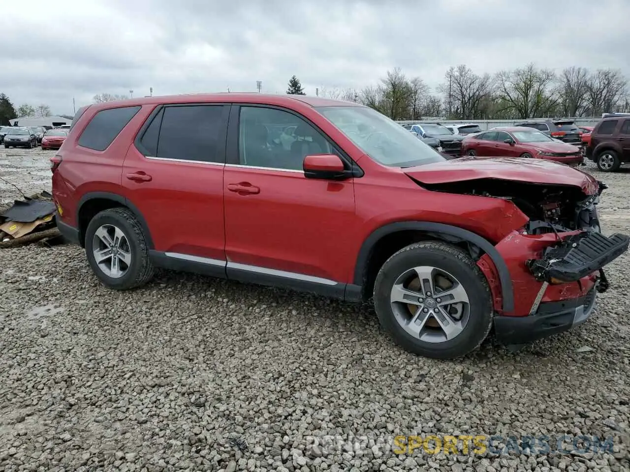 4 Photograph of a damaged car 5FNYG1H52PB040998 HONDA PILOT 2023