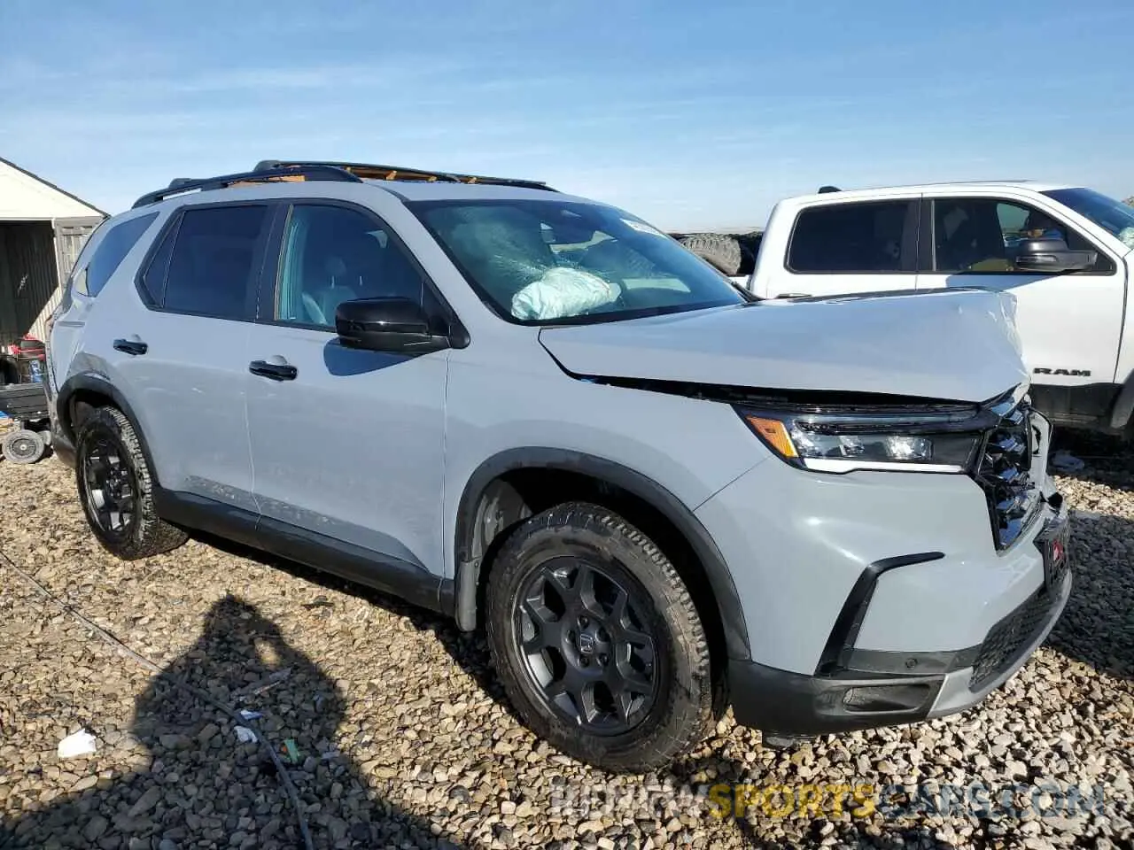 4 Photograph of a damaged car 5FNYG1H62PB022686 HONDA PILOT 2023