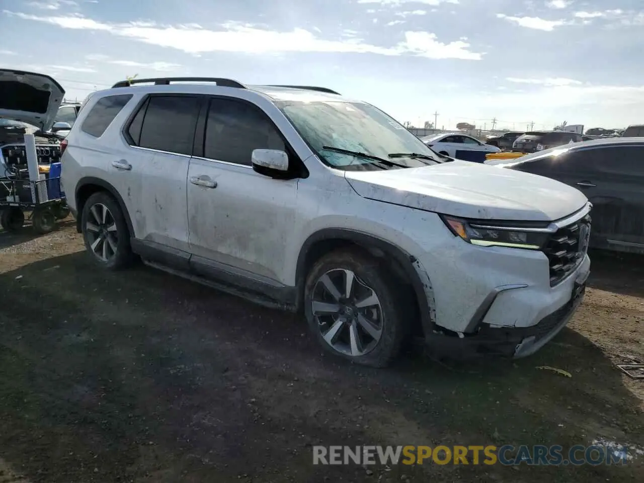4 Фотография поврежденного автомобиля 5FNYG1H71PB010909 HONDA PILOT 2023