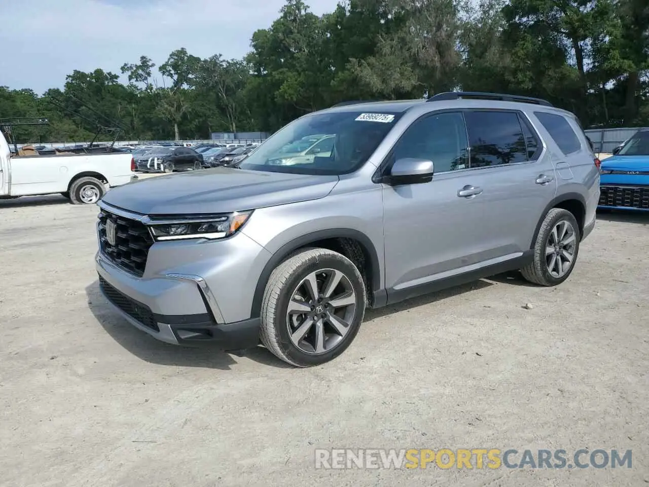 1 Photograph of a damaged car 5FNYG1H7XPB026008 HONDA PILOT 2023