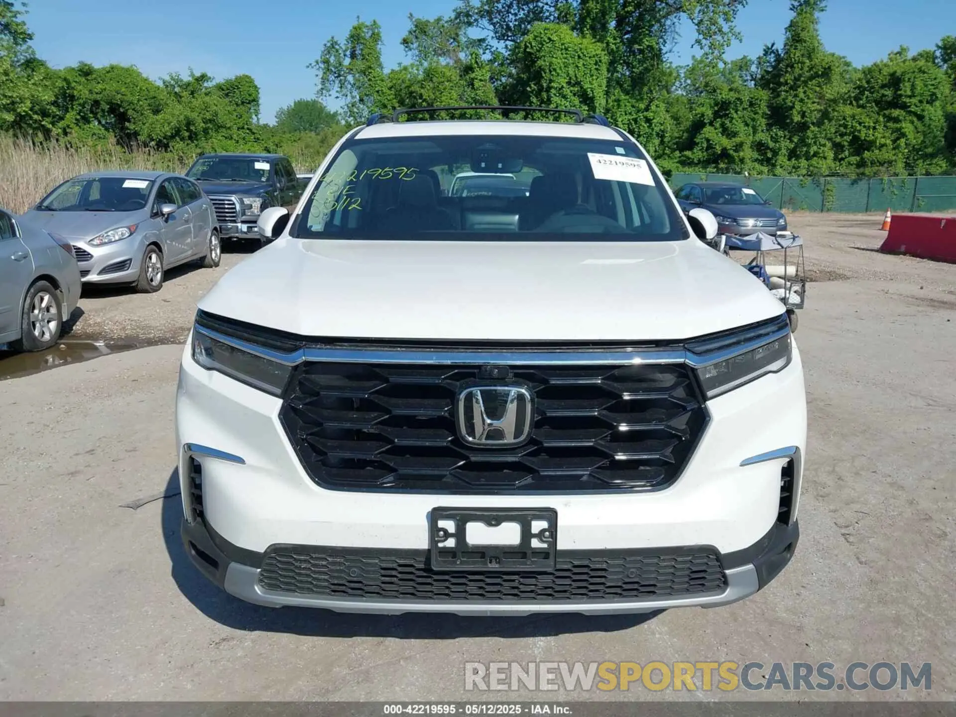 12 Photograph of a damaged car 5FNYG1H82PB046438 HONDA PILOT 2023