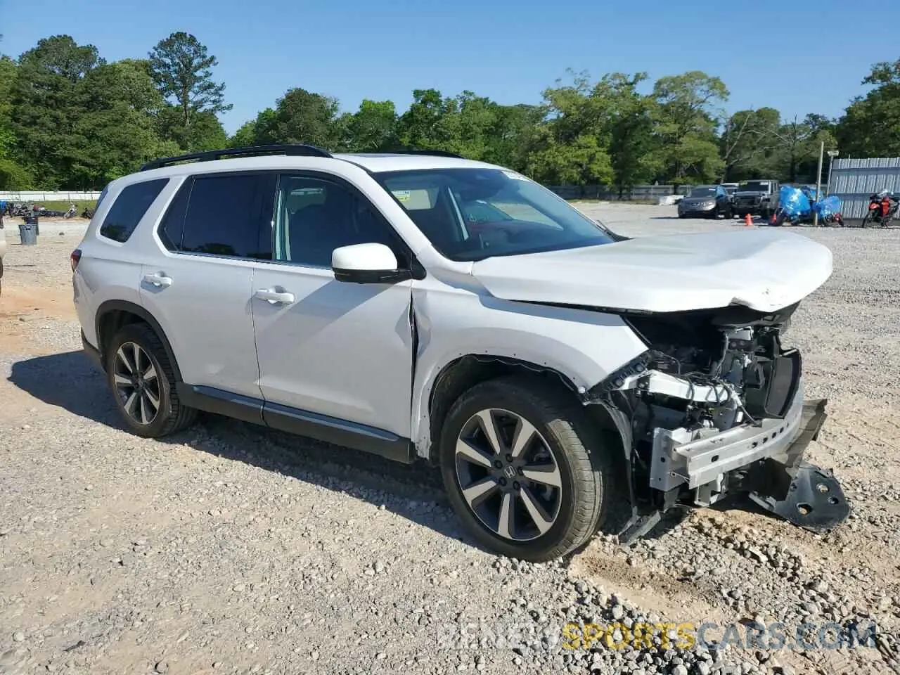 4 Photograph of a damaged car 5FNYG1H86PB030033 HONDA PILOT 2023