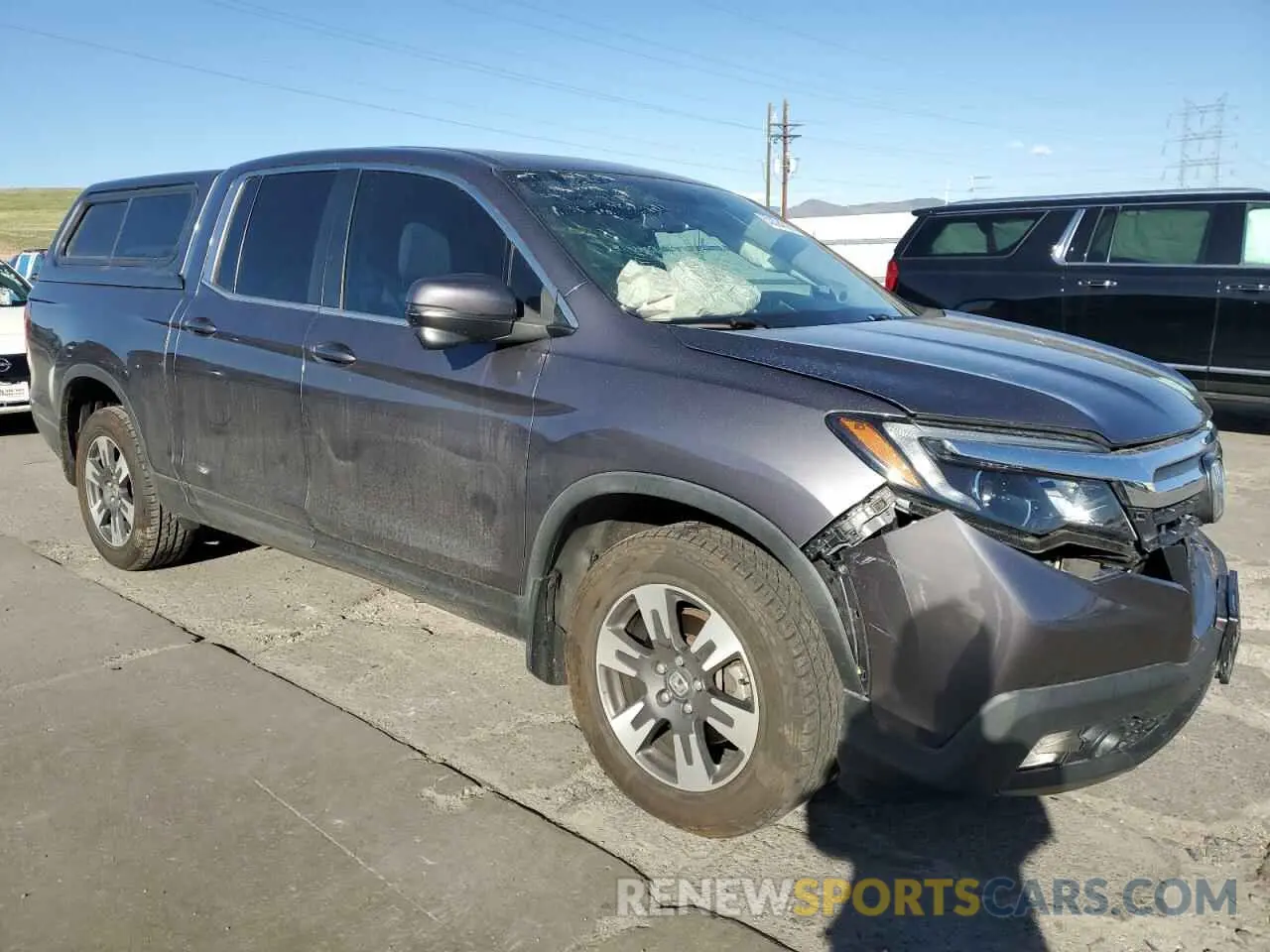 4 Photograph of a damaged car 5FPYK3F67KB027637 HONDA RIDGELINE 2019