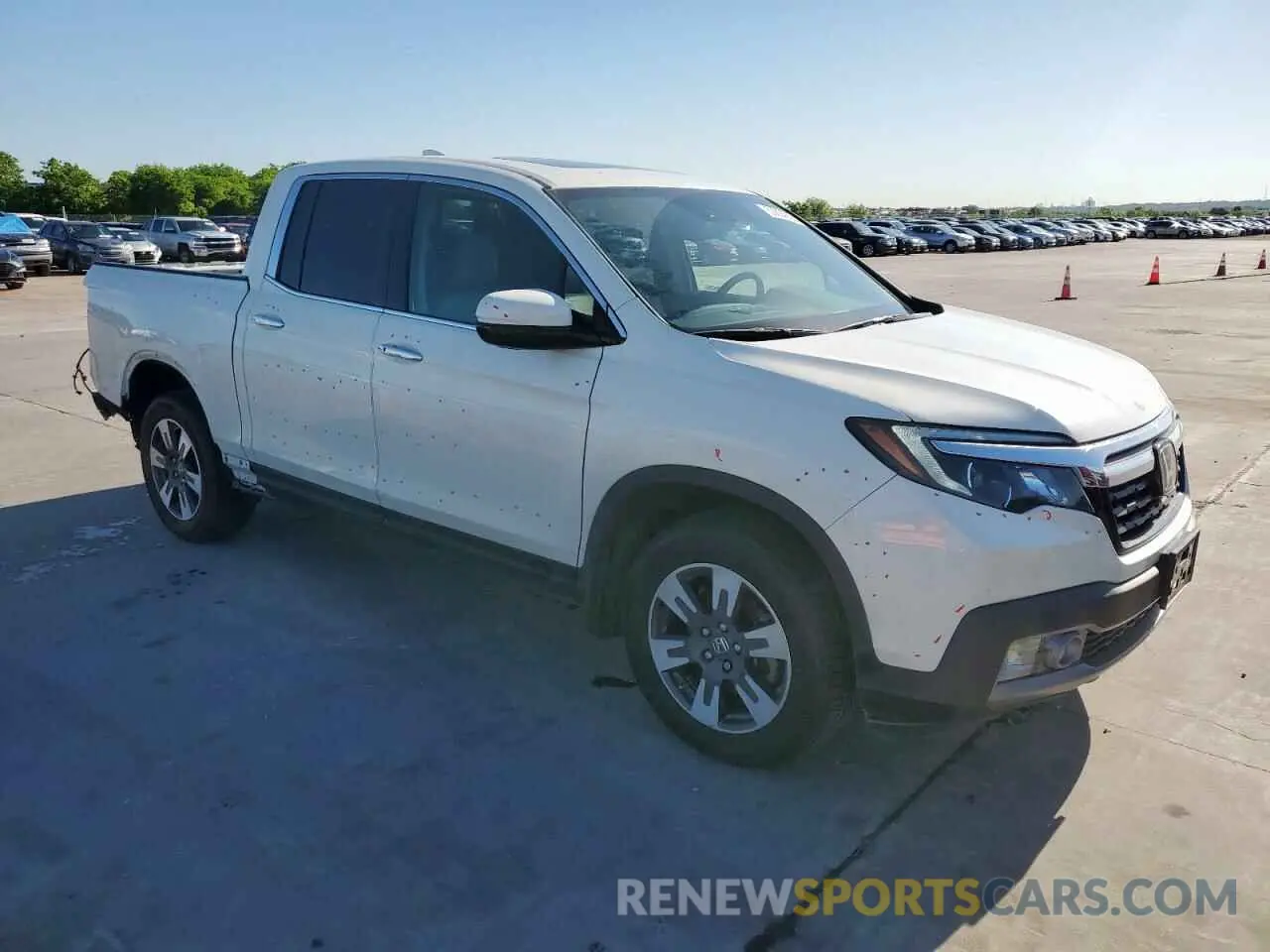 4 Photograph of a damaged car 5FPYK3F7XKB002241 HONDA RIDGELINE 2019