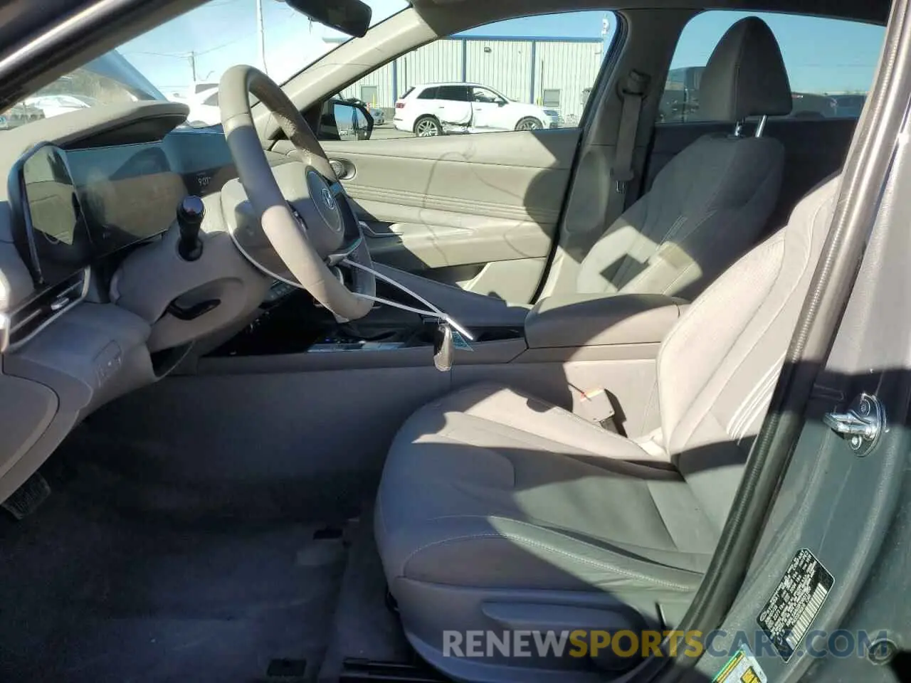 7 Photograph of a damaged car KMHLS4AG9PU601500 HYUNDAI ELANTRA 2023
