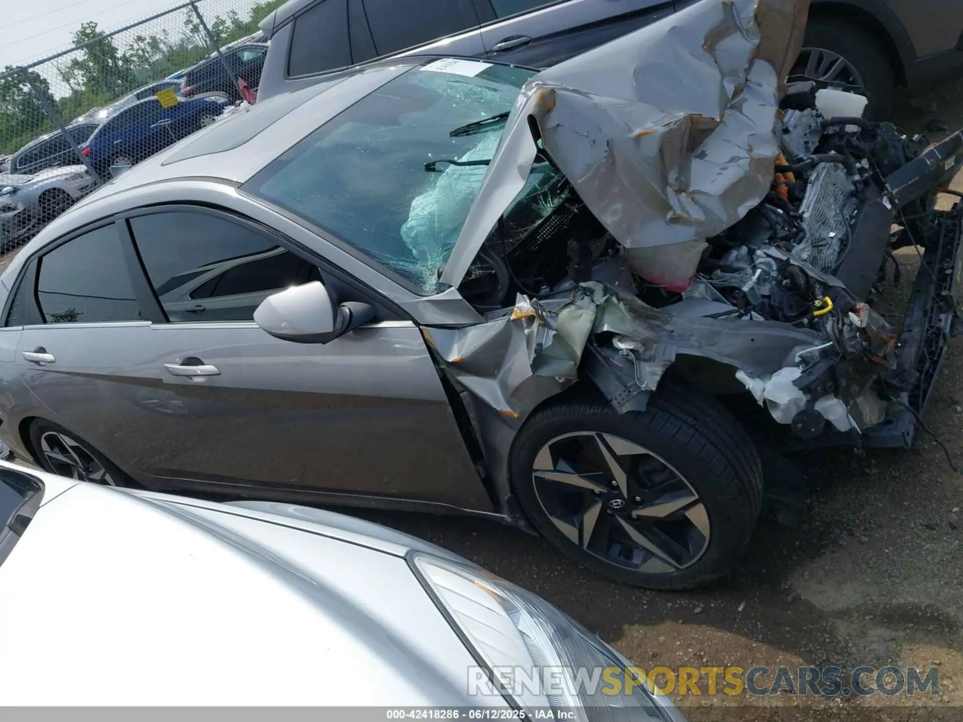 12 Photograph of a damaged car KMHLN4AJ0PU057889 HYUNDAI ELANTRA HYBRID 2023