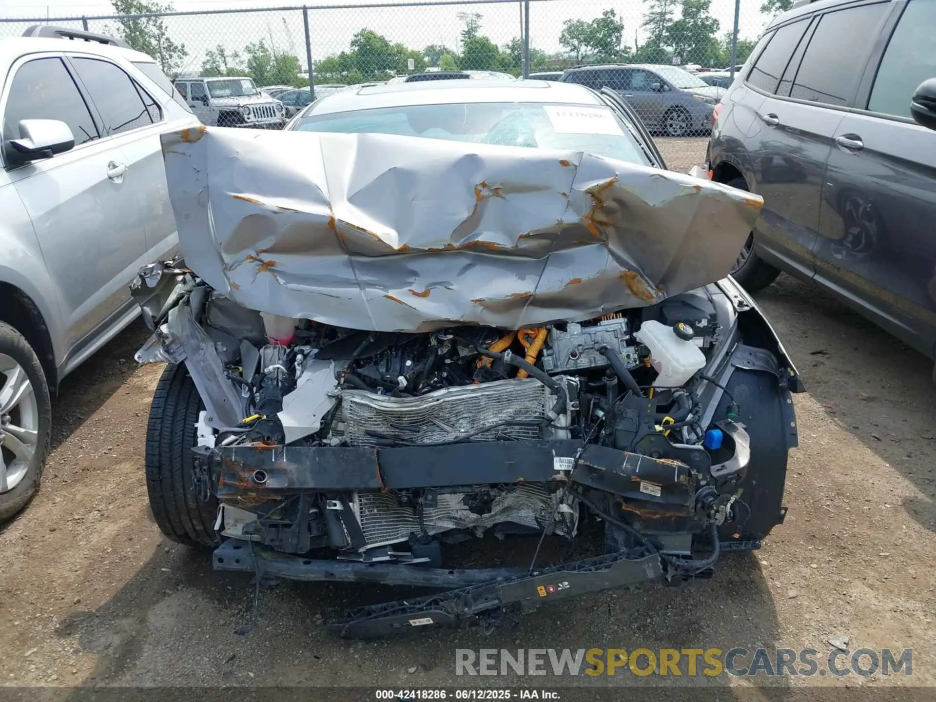 6 Photograph of a damaged car KMHLN4AJ0PU057889 HYUNDAI ELANTRA HYBRID 2023