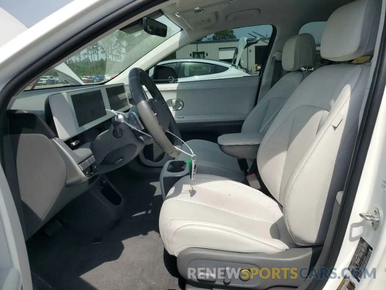 7 Photograph of a damaged car KM8KN4AE1PU163055 HYUNDAI IONIQ 2023