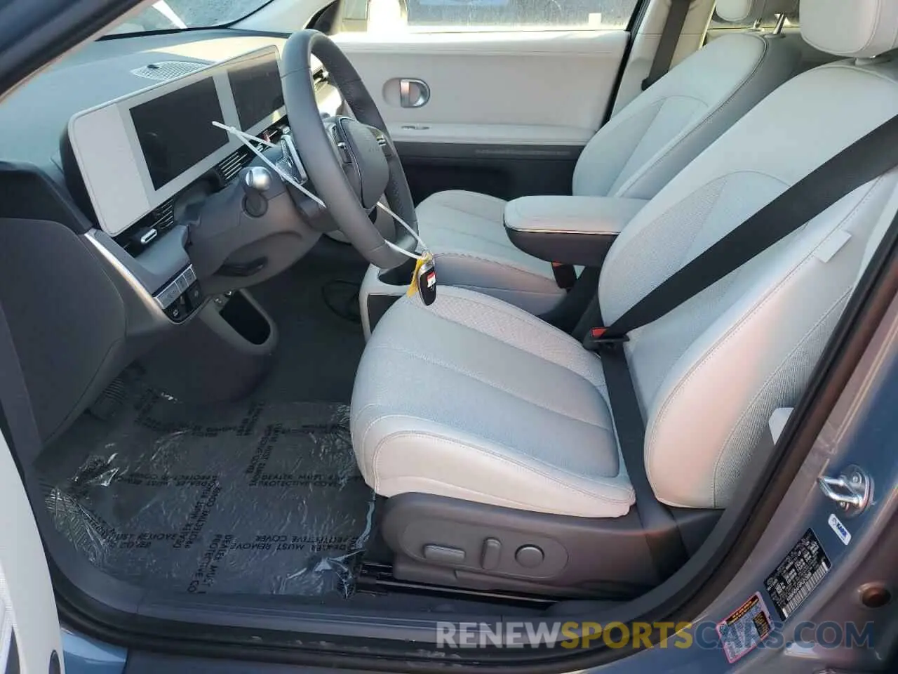 7 Photograph of a damaged car KM8KNDAF4PU213889 HYUNDAI IONIQ 2023