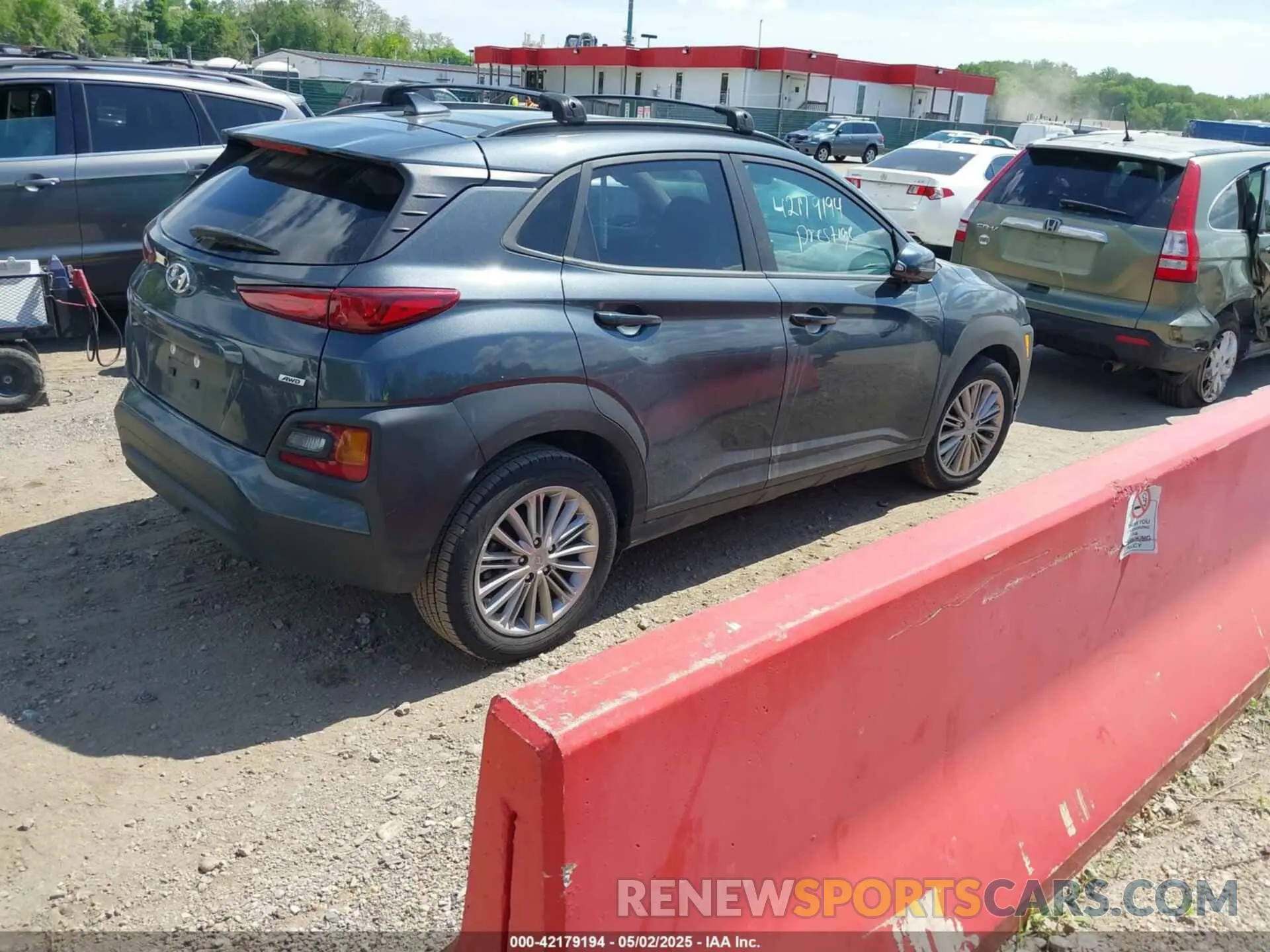 4 Photograph of a damaged car KM8K6CAA9MU676134 HYUNDAI KONA 2021