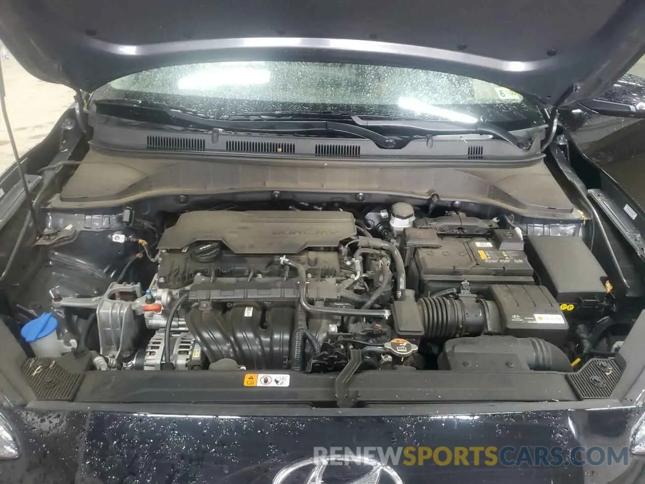 12 Photograph of a damaged car KM8K6CAB9PU946671 HYUNDAI KONA 2023