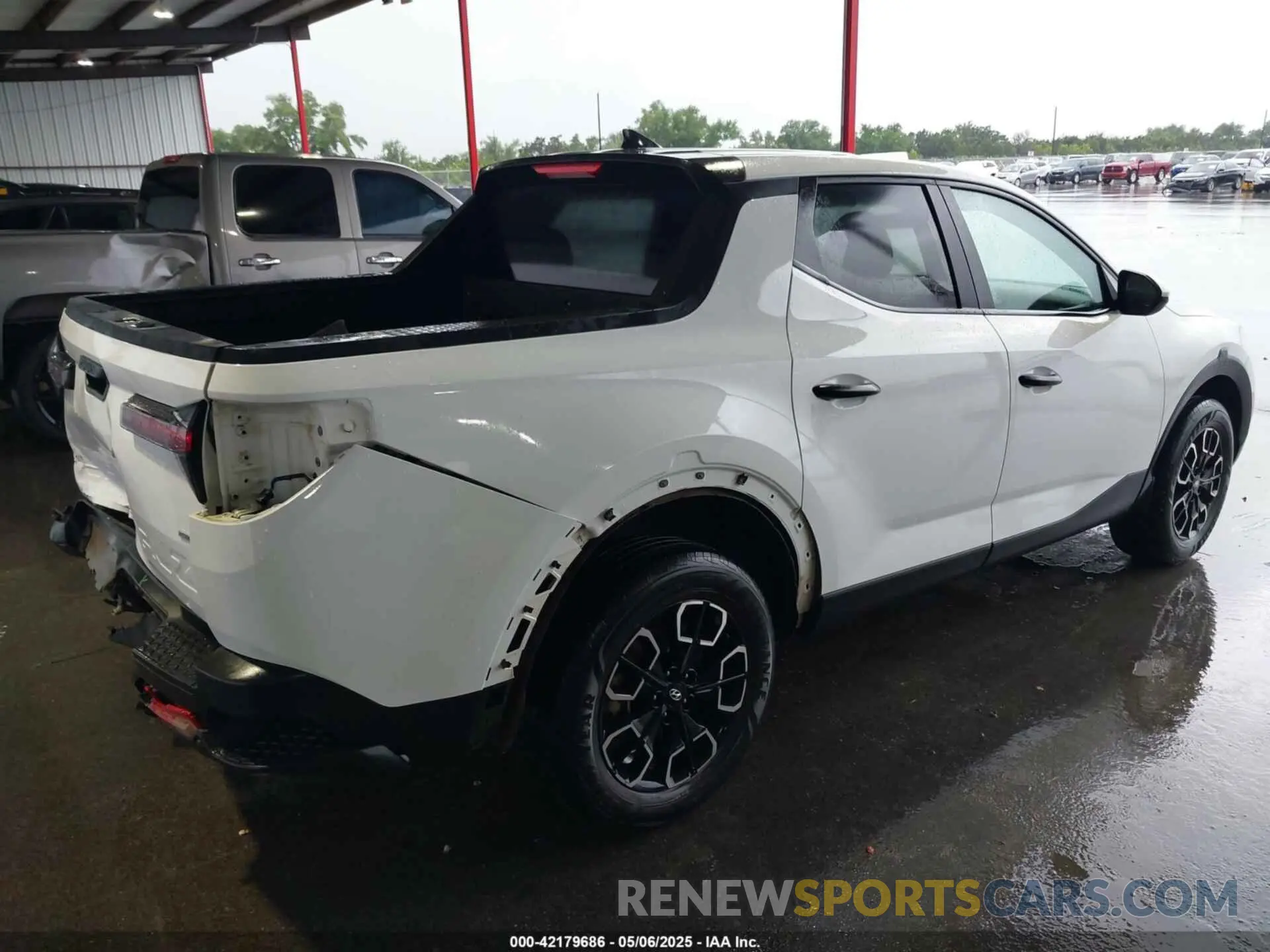 4 Photograph of a damaged car 5NTJADAE9NH028880 HYUNDAI SANTA CRUZ 2022
