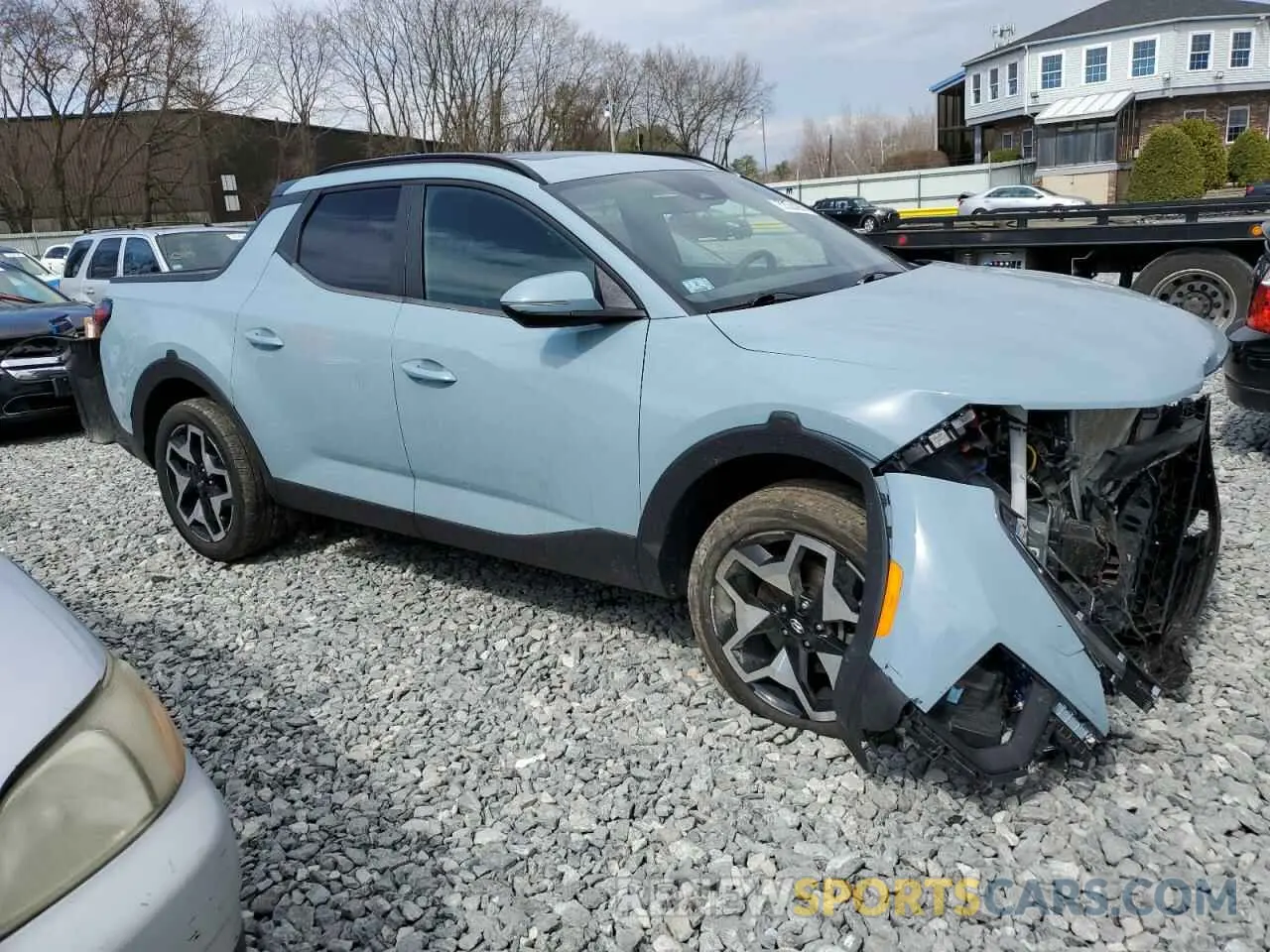 4 Photograph of a damaged car 5NTJEDAF0NH013262 HYUNDAI SANTA CRUZ 2022
