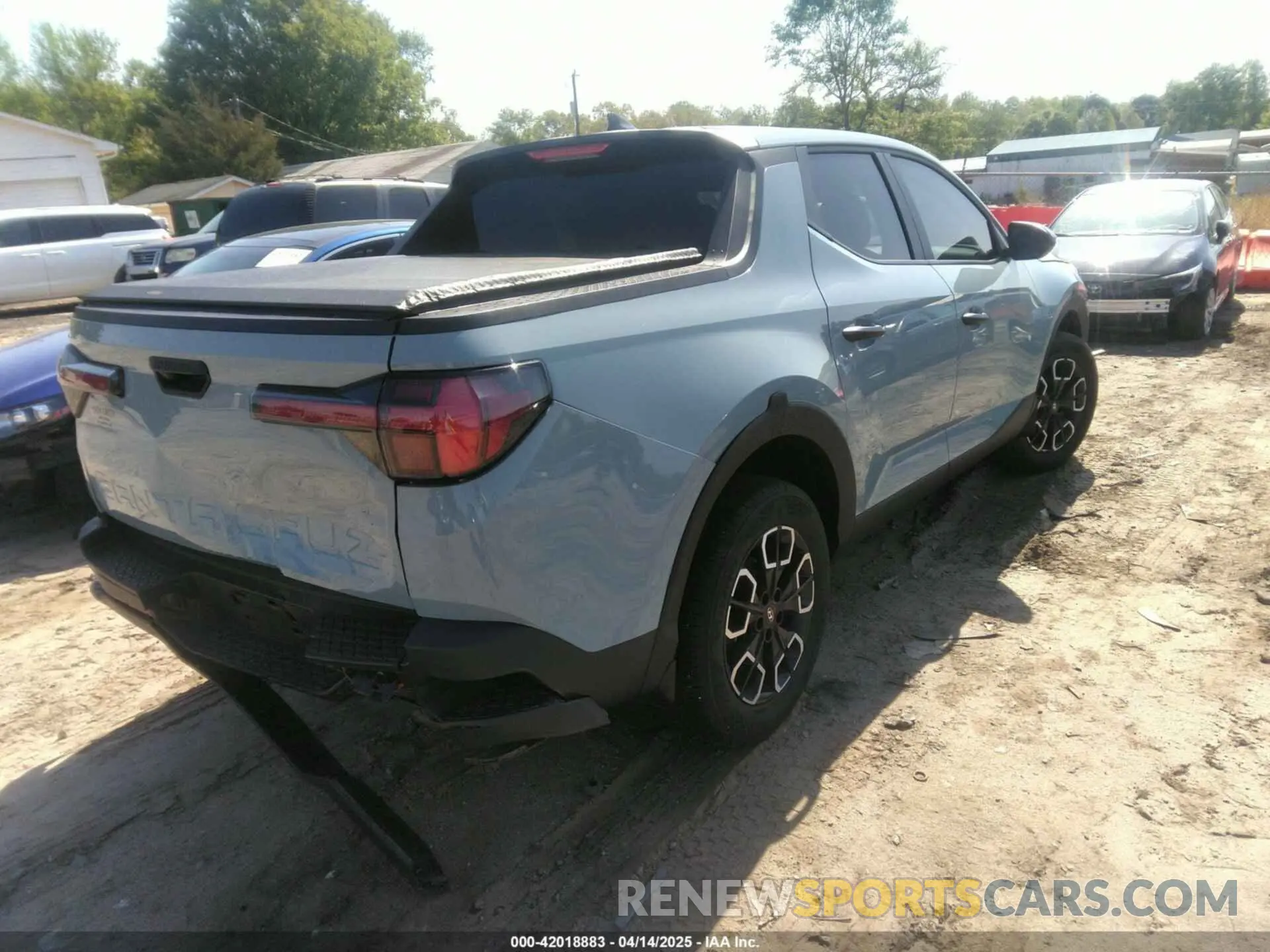 4 Photograph of a damaged car 5NTJADAE8PH067852 HYUNDAI SANTA CRUZ 2023