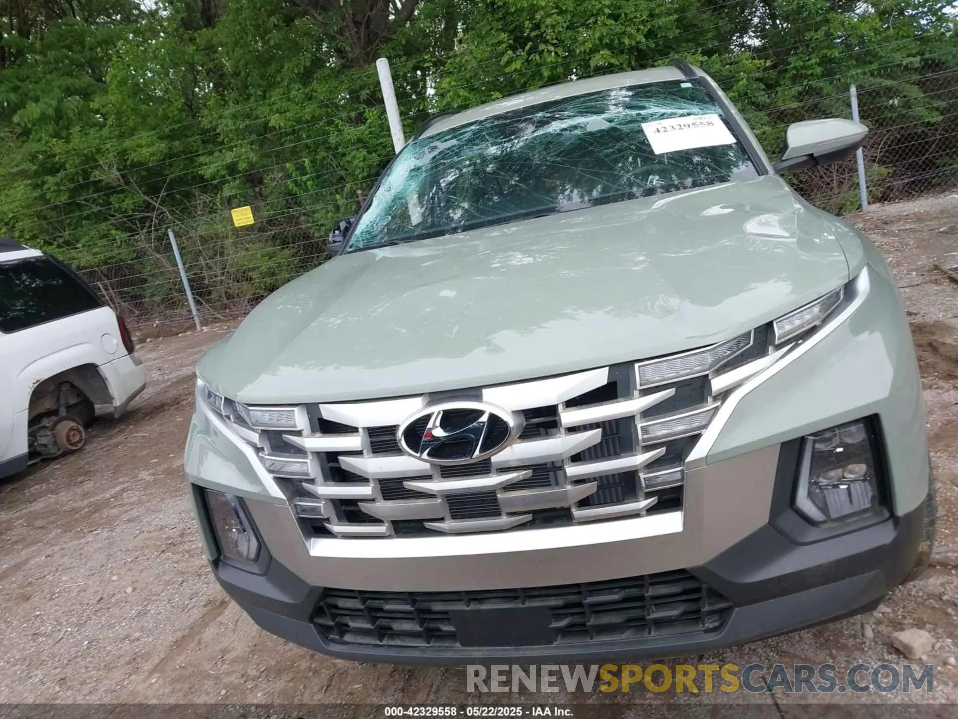 12 Photograph of a damaged car 5NTJDDAF9PH068394 HYUNDAI SANTA CRUZ 2023