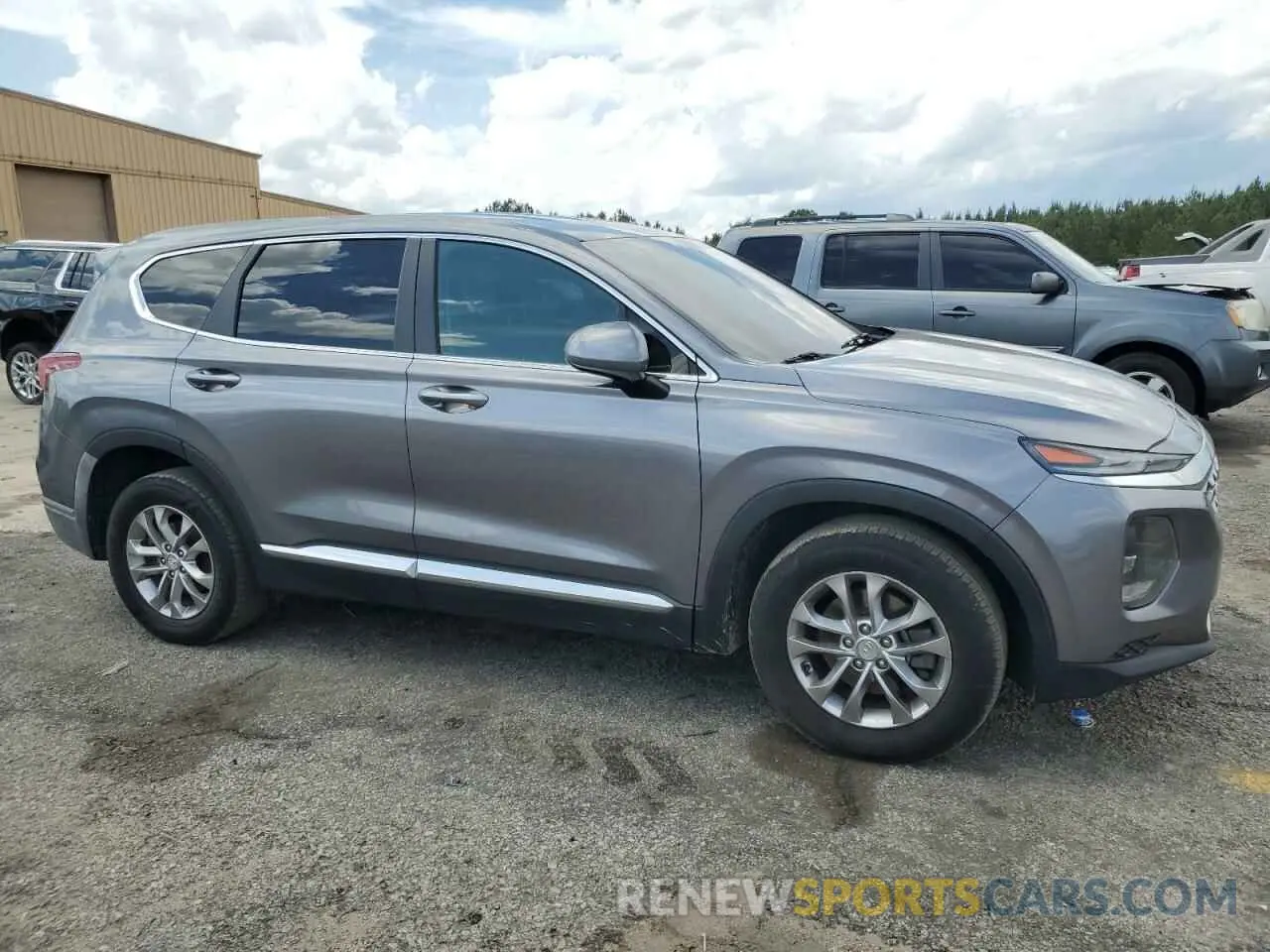 4 Photograph of a damaged car 5NMS23AD9KH019915 HYUNDAI SANTA FE 2019