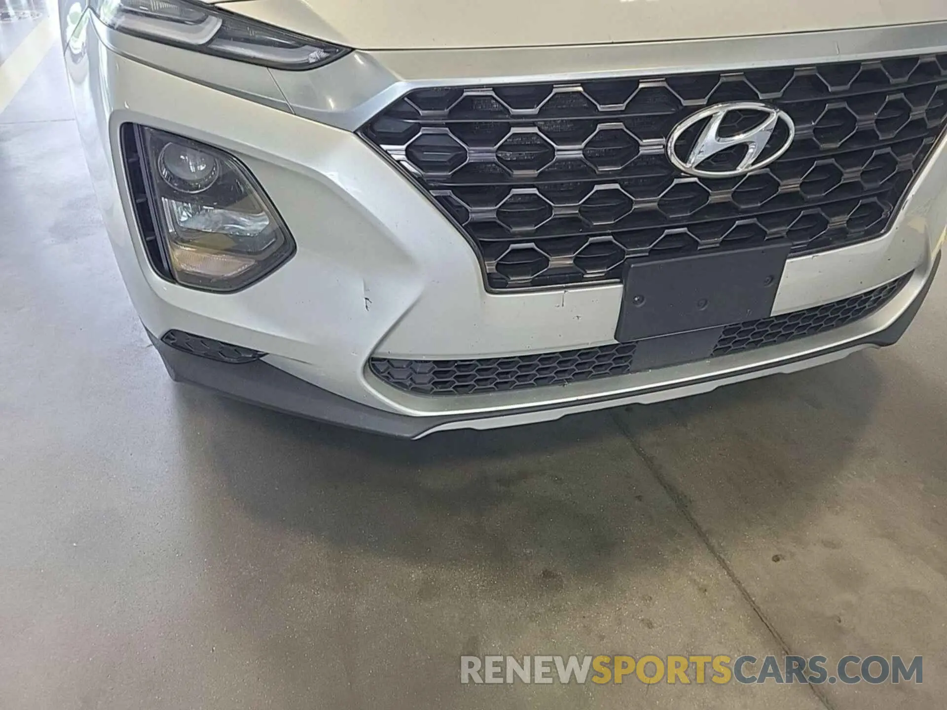 10 Photograph of a damaged car 5NMS2CADXKH044032 HYUNDAI SANTA FE 2019