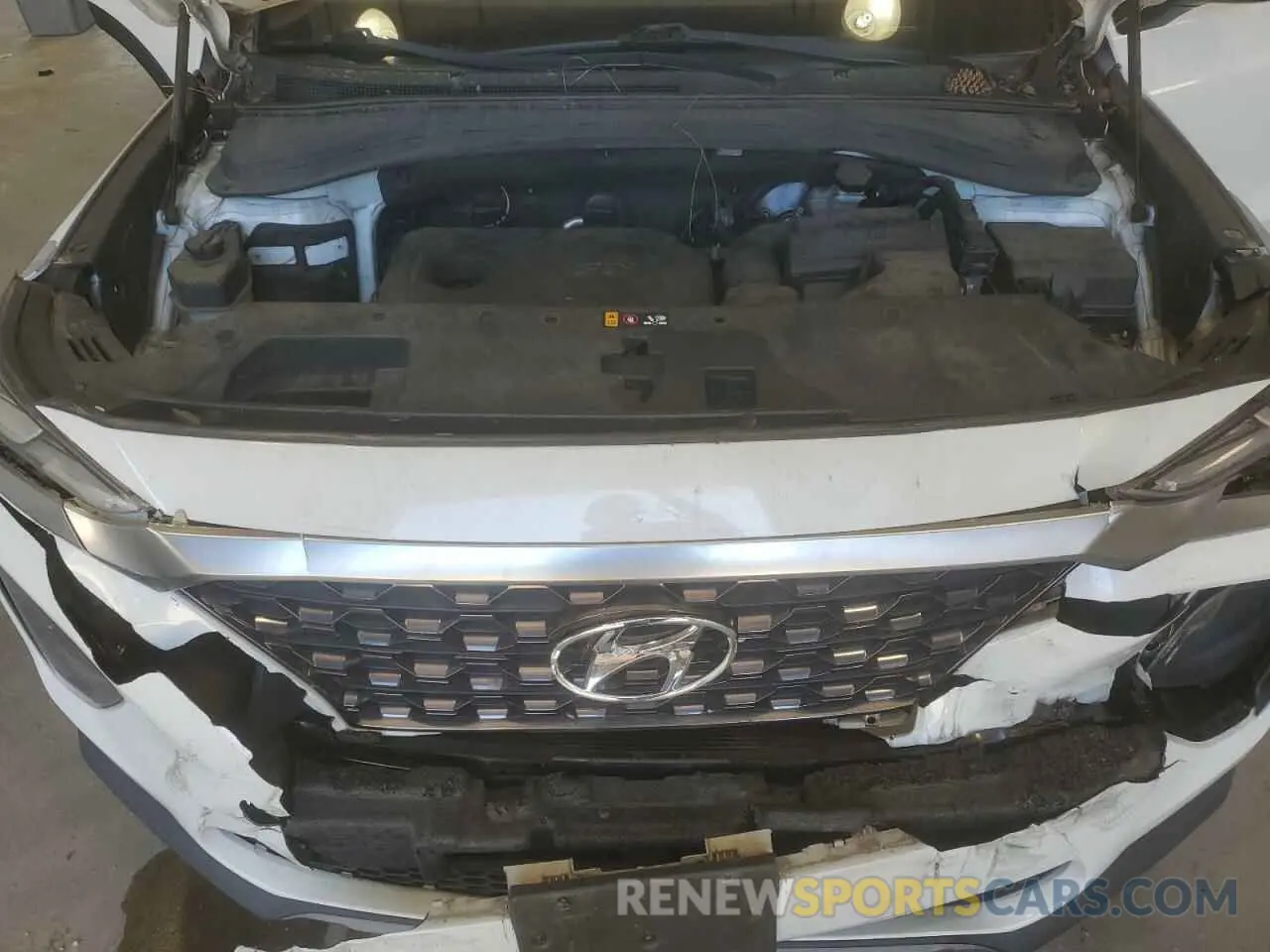 12 Photograph of a damaged car 5NMS33AD3KH004579 HYUNDAI SANTA FE 2019