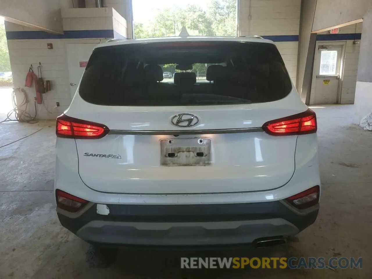 6 Photograph of a damaged car 5NMS33AD3KH004579 HYUNDAI SANTA FE 2019