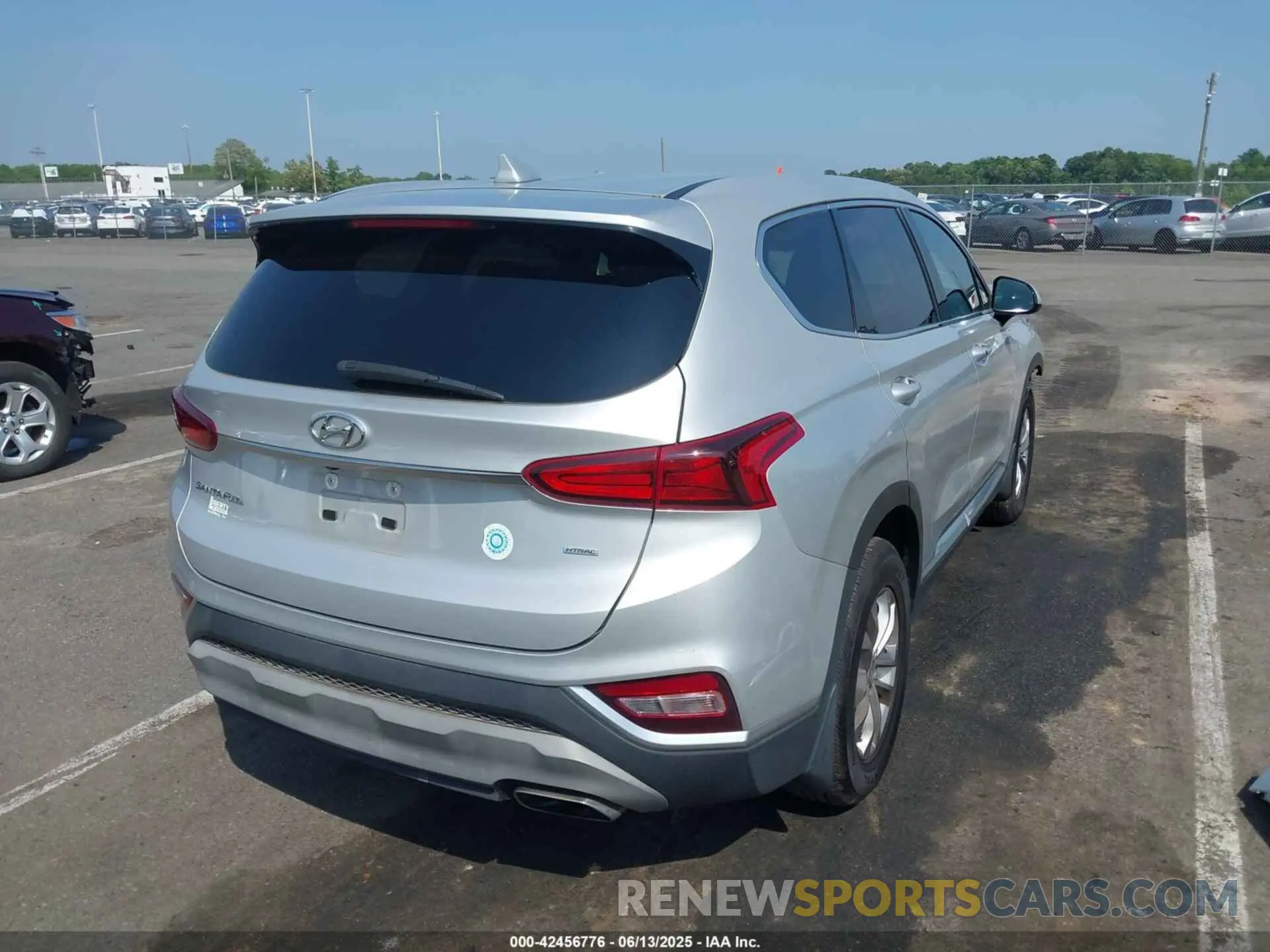 4 Photograph of a damaged car 5NMS3CAD4KH095474 HYUNDAI SANTA FE 2019