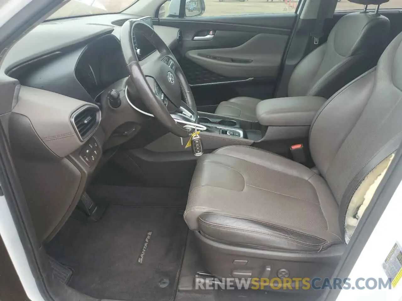 7 Photograph of a damaged car 5NMS5CAAXKH018883 HYUNDAI SANTA FE 2019