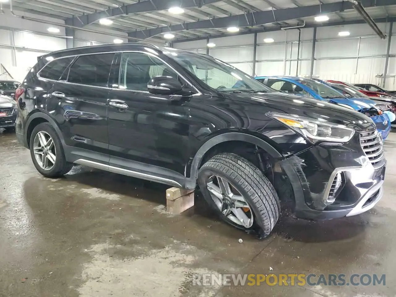 4 Photograph of a damaged car KM8SRDHF1KU309871 HYUNDAI SANTA FE 2019