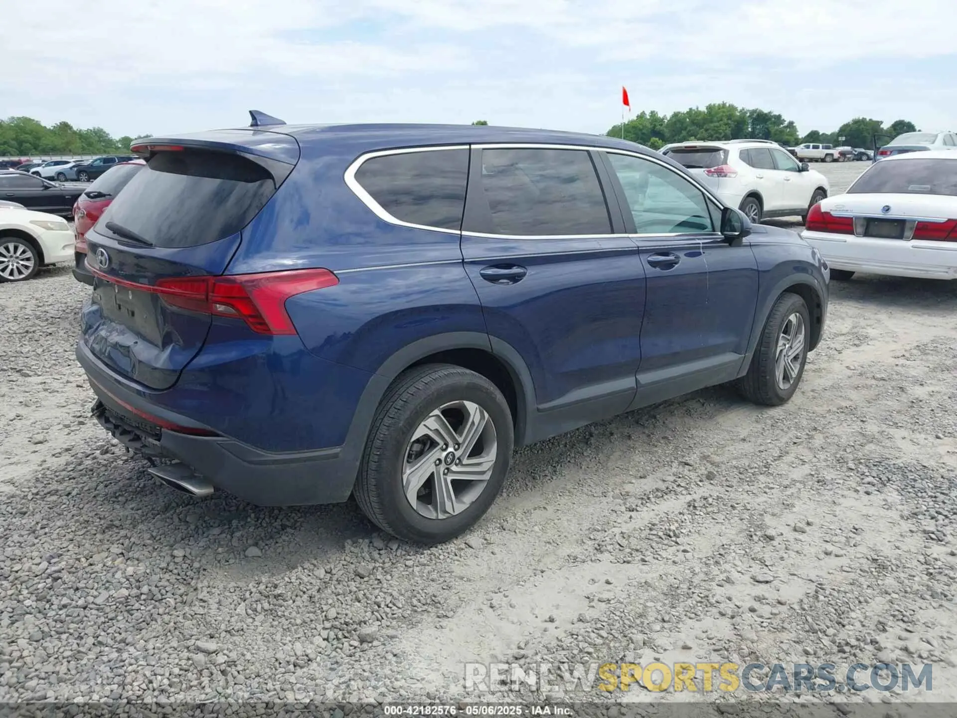 4 Photograph of a damaged car 5NMS14AJ2MH323542 HYUNDAI SANTA FE 2021