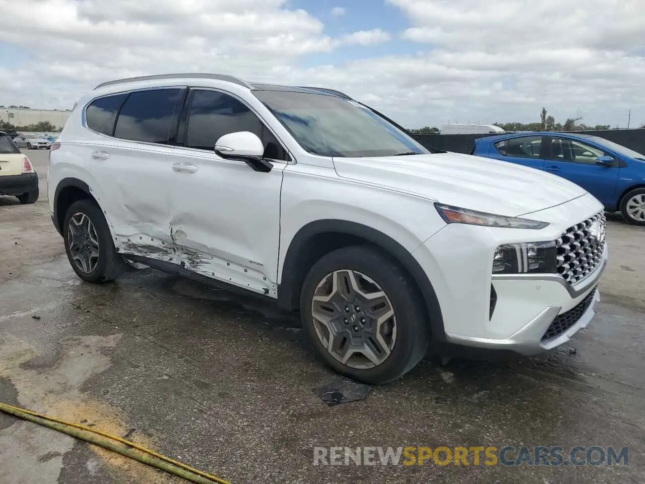 4 Photograph of a damaged car 5NMS44AL1MH318793 HYUNDAI SANTA FE 2021